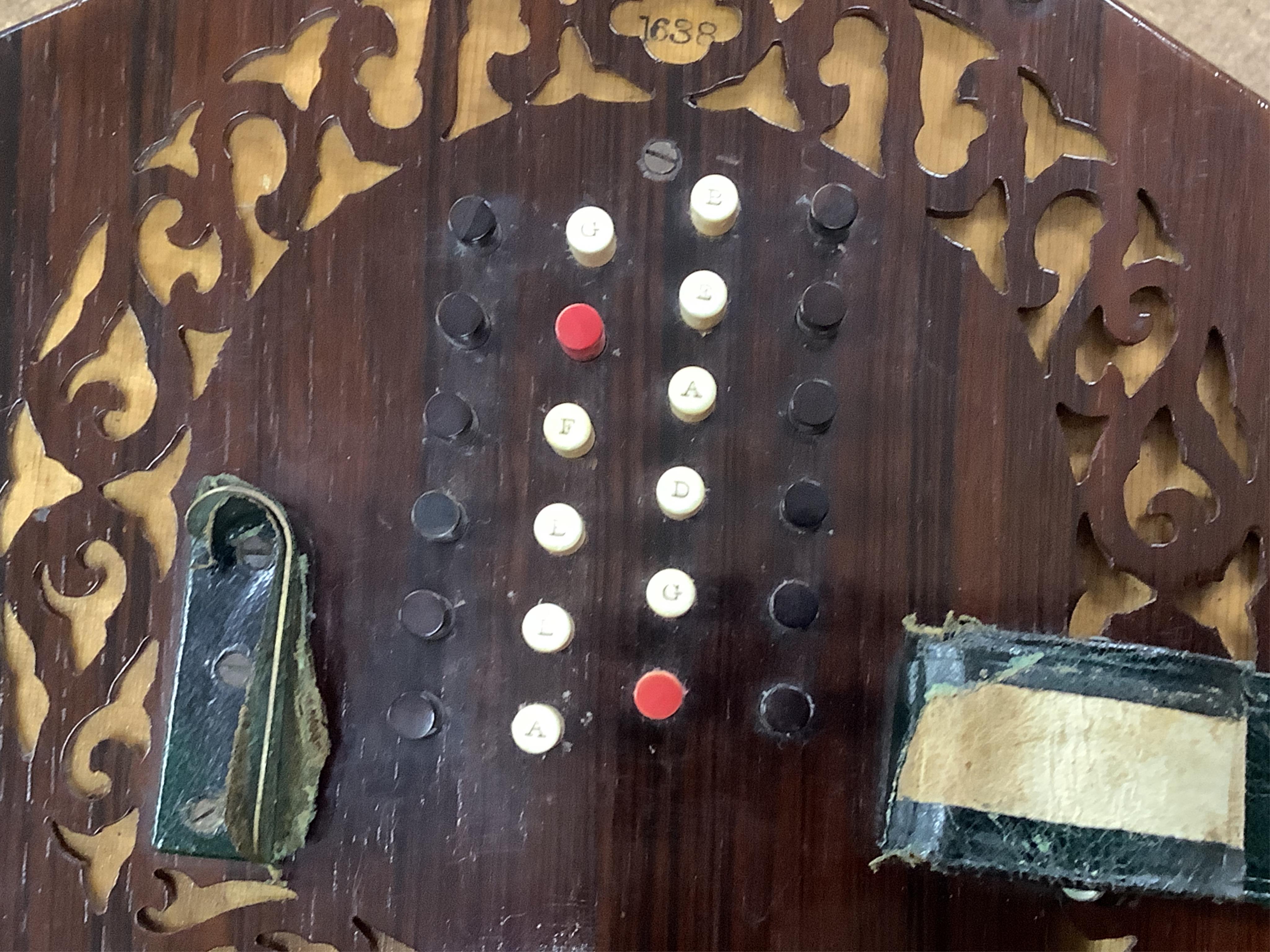 A Wheatstone concertina, in rosewood case, case 16.5cm high. CITES Submission reference, PS7AQEEA